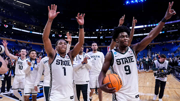 Michigan State guard Jeremy Fears Jr. (1), left, guard Trey Fort (9), right, and teammates wave at fans to celebrate 77-69 win over Louisville at the NCAA Tournament Second Round at KeyBank Center in Buffalo on Saturday, March 21, 2026. Michigan State guard Jeremy Fears Jr. (1), left, guard Trey Fort (9), right, and teammates wave at fans to celebrate 77-69 win over Louisville at the NCAA Tournament Second Round at KeyBank Center in Buffalo on Saturday, March 21, 2026.