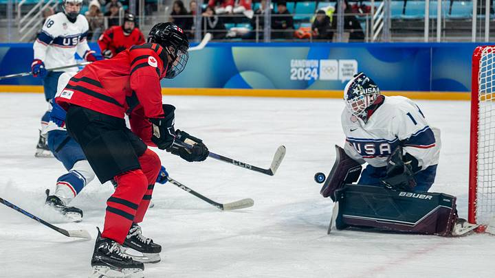 Jan 30, 2024; Gangwon-do, KOR; Tynan Lawrence (CAN) is denied by Xavier Wendt (USA) in the Ice Hockey Men s 6-on-6 Tournament Semifinals between Canada and (USA) at the Gangneung Hockey Centre. The Winter Youth Olympic Games, Gangwon, South Korea, Tuesday 30 January 2024. Mandatory Credit: OIS/Thomas Lovelock-Imagn Images