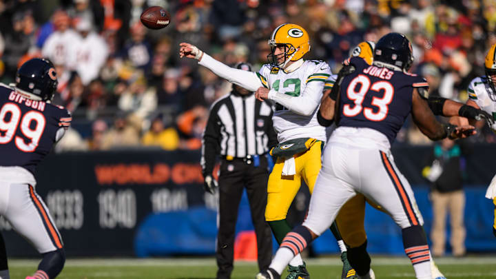 Aaron Rodgers gets off a pass in 2022 at Soldier Field under rush from Justin Jones and Trevis Gipson, two Bears long gone.