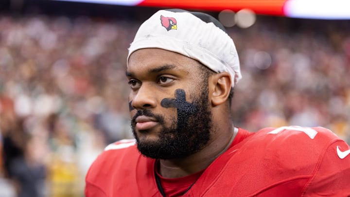 Oct 19, 2025; Glendale, Arizona, USA; Arizona Cardinals offensive lineman Paris Johnson Jr. (70) against the Green Bay Packers at State Farm Stadium. Mandatory Credit: Mark J. Rebilas-Imagn Images