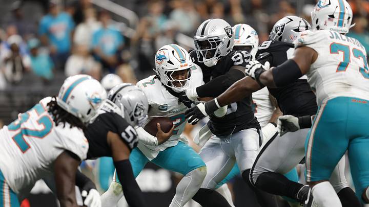 Las Vegas Raiders defensive tackle Thomas Booker IV (99) sacks Miami Dolphins quarterback Malik Willis (2) in the fourth quarter at Allegiant Stadium. Las Vegas Raiders defensive tackle Thomas Booker IV (99) sacks Miami Dolphins quarterback Malik Willis (2) in the fourth quarter at Allegiant Stadium.