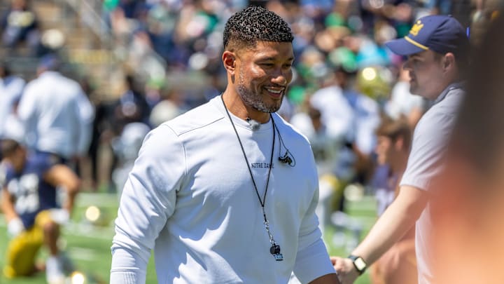 Apr 25, 2026; Notre Dame, IN, USA; Notre Dame Fighting Irish head coach Marcus Freeman greets players before the Blue-Gold game at Notre Dame Stadium. Mandatory Credit: Michael Caterina-Imagn Images