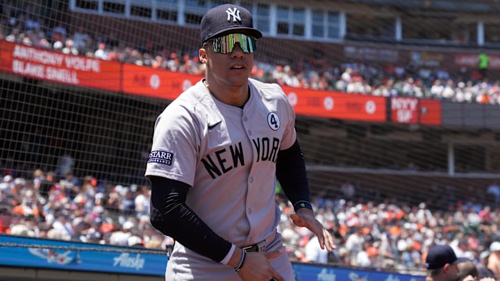 Jun 2, 2024; San Francisco, California, USA; New York Yankees right fielder Juan Soto (22) jogs onto the field while wearing a patch to commemorate Lou Gehrig Day before the game against the San Francisco Giants at Oracle Park.