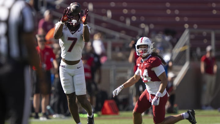 Virginia Tech Hokies linebacker Keonta Jenkins intercepts the ball in front of Stanford Cardinal receiver Tiger Bachmeier