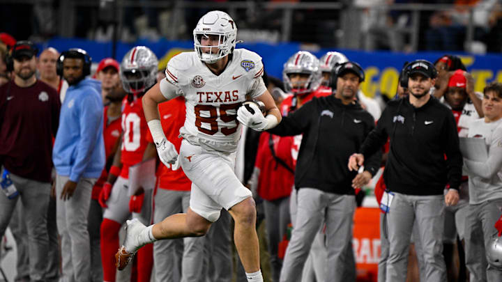 Jan 10, 2025; Arlington, TX, USA; Texas Longhorns tight end Gunnar Helm (85) in action during the game between the Texas Longhorns and the Ohio State Buckeyes at AT&T Stadium. Mandatory Credit: Jerome Miron-Imagn Images Jan 10, 2025; Arlington, TX, USA; Texas Longhorns tight end Gunnar Helm (85) in action during the game between the Texas Longhorns and the Ohio State Buckeyes at AT&T Stadium. Mandatory Credit: Jerome Miron-Imagn Images