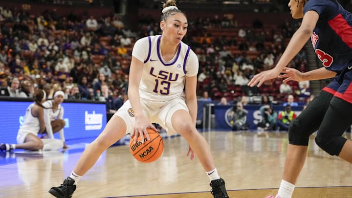 Mar 9, 2024; Greensville, SC, USA; LSU Lady Tigers guard Last-Tear Poa (13) handles the ball against the Ole Miss Rebels during the second half at Bon Secours Wellness Arena. Mandatory Credit: Jim Dedmon-Imagn Images