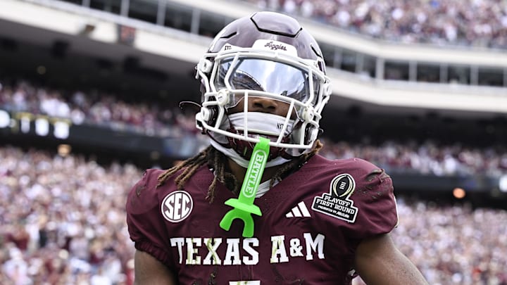 Texas A&M Aggies wide receiver Mario Craver (1) celebrates a catch against the Texas A&M Aggies during first half of the first round game of the CFP National Playoff at Kyle Field. 
