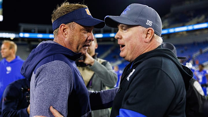 Auburn's Hugh Freeze and Kentucky's Mark Stoops battle in what's being deemed a "loser leaves town matchup" Auburn's Hugh Freeze and Kentucky's Mark Stoops battle in what's being deemed a "loser leaves town matchup"