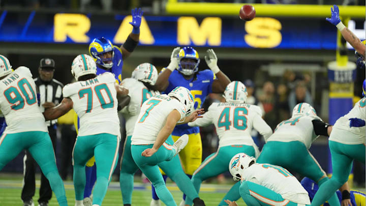 Miami Dolphins kicker Jason Sanders (7) kicks a 50-yard field goal out of the hold of punter Jake Bailey (16) against the Los Angeles Ramsin the second half at SoFi Stadium.