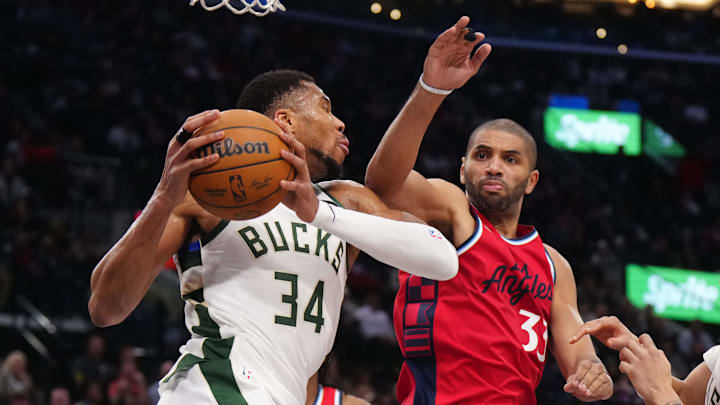 Jan 25, 2025; Inglewood, California, USA; Milwaukee Bucks forward Giannis Antetokounmpo (34) is defended by LA Clippers forward Nicolas Batum (33) in the second half at Intuit Dome. Mandatory Credit: Kirby Lee-Imagn Images Jan 25, 2025; Inglewood, California, USA; Milwaukee Bucks forward Giannis Antetokounmpo (34) is defended by LA Clippers forward Nicolas Batum (33) in the second half at Intuit Dome. Mandatory Credit: Kirby Lee-Imagn Images