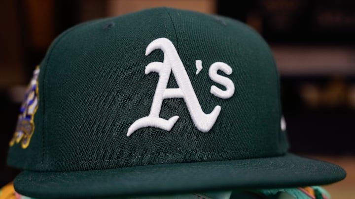 Apr 18, 2025; Milwaukee, Wisconsin, USA;  General view of an Athletics hat during batting practice prior to  the game against the Milwaukee Brewers at American Family Field. Mandatory Credit: Jeff Hanisch-Imagn Images