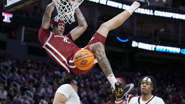 Mar 27, 2025; San Francisco, CA, USA; Arkansas Razorbacks forward Trevon Brazile (4) drives to the hoop past Texas Tech Red Raiders forward Darrion Williams (5) during the second half during a West Regional semifinal of the 2025 NCAA tournament at Chase Center. Mandatory Credit: Kyle Terada-Imagn Images