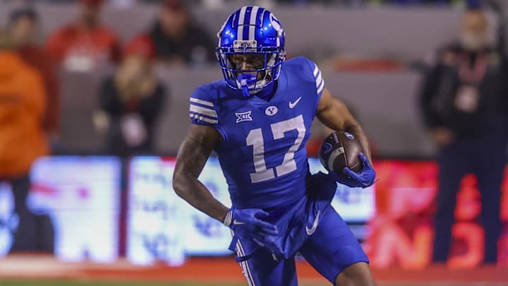 Nov 9, 2024; Salt Lake City, Utah, USA; Brigham Young Cougars wide receiver Keelan Marion (17) runs after a catch against the Utah Utes during the first quarter at Rice-Eccles Stadium. Mandatory Credit: Rob Gray-Imagn Images