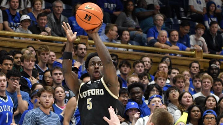 Nov 16, 2024; Durham, North Carolina, USA; Wofford Terriers guard Justin Bailey (5) shoots the ball in the first half against the Duke Blue Devils at Cameron Indoor Stadium. Mandatory Credit: Zachary Taft-Imagn Images Nov 16, 2024; Durham, North Carolina, USA; Wofford Terriers guard Justin Bailey (5) shoots the ball in the first half against the Duke Blue Devils at Cameron Indoor Stadium. Mandatory Credit: Zachary Taft-Imagn Images