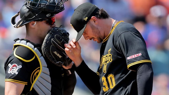 Mar 26, 2026; New York City, New York, USA; Pittsburgh Pirates catcher Henry Davis (32) talks to starting pitcher Paul Skenes (30) during the first inning against the New York Mets at Citi Field. Mandatory Credit: Brad Penner-Imagn Images