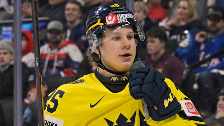 Dec 31, 2025; St. Paul, Minnesota, USA; Sweden forward Eddie Genborg (25) celebrates his power play goal against USA during the second period in group play during the 2026 IIHF World Junior Championship at Grand Casino Arena. Mandatory Credit: Nick Wosika-Imagn Images Dec 31, 2025; St. Paul, Minnesota, USA; Sweden forward Eddie Genborg (25) celebrates his power play goal against USA during the second period in group play during the 2026 IIHF World Junior Championship at Grand Casino Arena. Mandatory Credit: Nick Wosika-Imagn Images