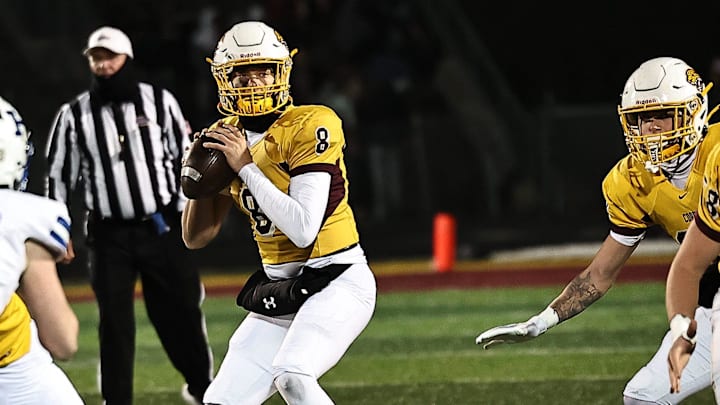 Cooper quarterback Cam O'Hara drops back to pass during Cooper's state semifinal win over Highlands Friday, Nov 29, 2024.