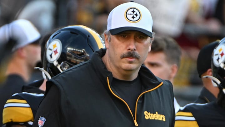 Aug 9, 2024; Pittsburgh, Pennsylvania, USA;  Pittsburgh Steelers offensive coordinator Arthur Smith watches warm ups against the Houston Texans at Acrisure Stadium. Mandatory Credit: Barry Reeger-USA TODAY Sports