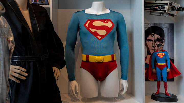 Costumes worn in Christopher Reeve’s Superman films are displayed inside the home office of Jay Towers, anchor for Fox 2 and host of “Jay Towers in the Morning,” in Oakland County on Wednesday, Aug. 20, 2025. Towers has amassed a collection of memorabilia spanning decades of Superman history.