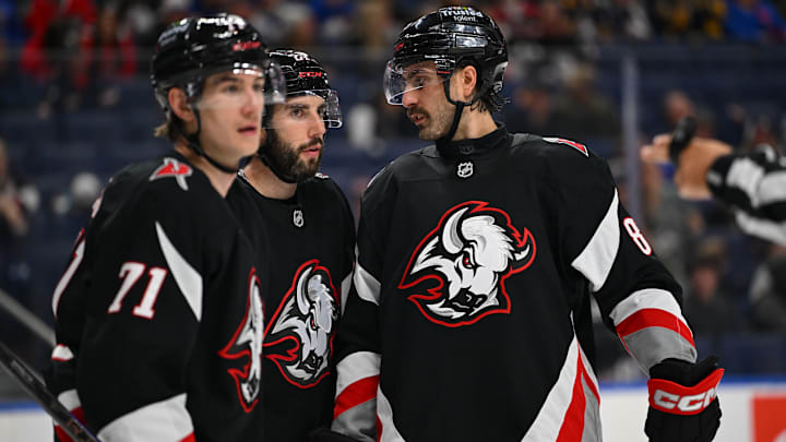 Buffalo Sabres players Ryan McLeod, Conor Timmins and Alex Tuch