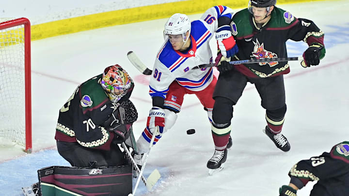 Mar 30, 2024; Tempe, Arizona, USA;  Arizona Coyotes goaltender Karel Vejmelka (70) defends as New