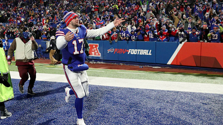 Bills quarterback Josh Allen celebrates with fans after beating the Patriots 47-17 in one of five blowout wins for favorites last weekend.