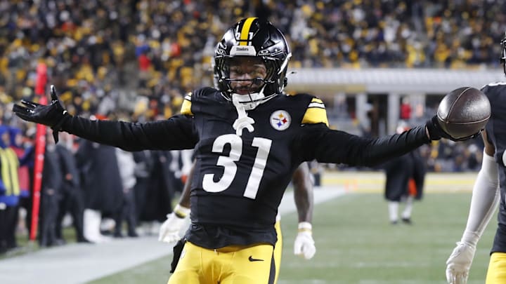 Jan 4, 2025; Pittsburgh, Pennsylvania, USA;  Pittsburgh Steelers cornerback Beanie Bishop Jr. (31) celebrates after intercepting a Cincinnati Bengals pass during the second quarter at Acrisure Stadium. Mandatory Credit: Charles LeClaire-Imagn Images