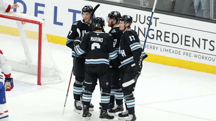 Jan 14, 2025; Salt Lake City, Utah, USA;  Utah Hockey Club celebrates a goal during the first period against the Montreal Canadiens at Delta Center. Mandatory Credit: Chris Nicoll-Imagn Images