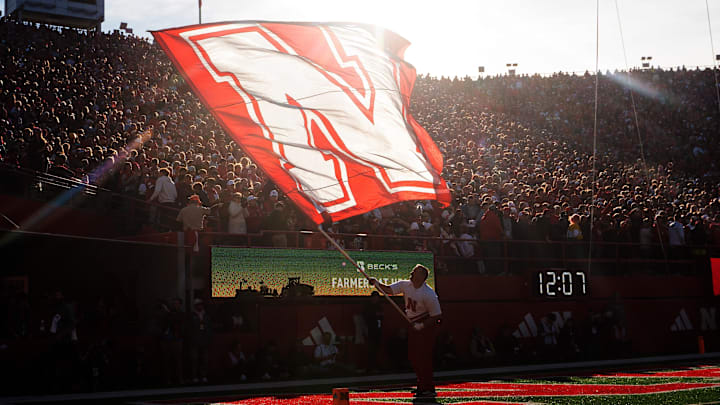The Nebraska Cornhuskers flag is waved after a touchdown against Wisconsin on Nov. 23, 2024.