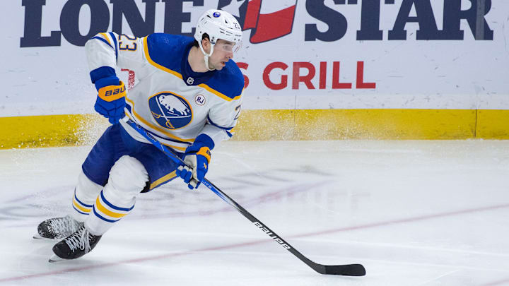 Dec 31 2023; Ottawa, Ontario, CAN; Buffalo Sabres defenseman Mattias Samuelsson (23) skates with the puck in the third period against the Ottawa Senators at the Canadian Tire Centre. Mandatory Credit: Marc DesRosiers-Imagn Images
