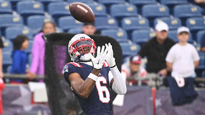 August 8, 2024; Foxborough, MA, USA;  New England Patriots wide receiver Javon Baker (6) warms up before a game against the Carolina Panthers at Gillette Stadium. Mandatory Credit: Eric Canha-Imagn Images