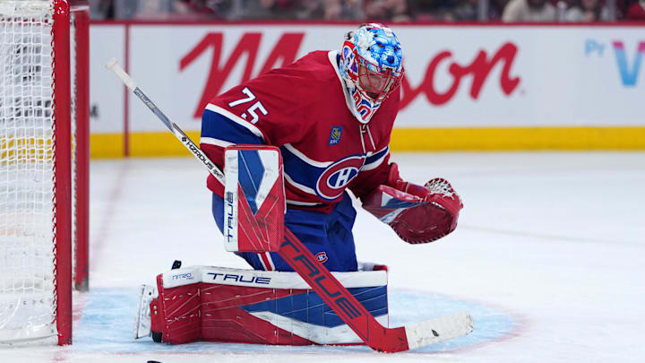 Feb 28, 2026; Montreal, Quebec, CAN; Montreal Canadiens goalie Jakub Dobes (75) makes a save against the Washington Capitals during the third period at the Bell Centre. Mandatory Credit: Eric Bolte-Imagn Images