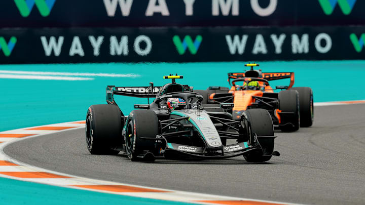 May 3, 2026; Miami Gardens, FL, USA; Mercedes driver Kimi Antonelli (12) leads McLaren driver Lando Norris (1) during the Crypto.com Miami Grand Prix at Miami International Autodrome. Mandatory Credit: Sam Navarro-Imagn Images