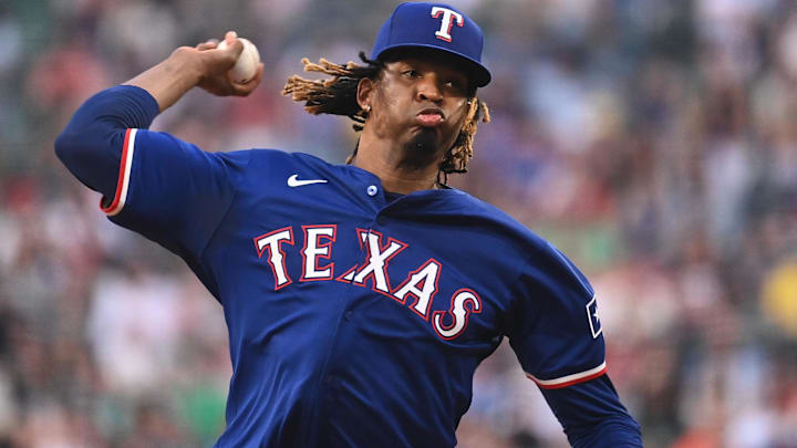 Texas Rangers starting pitcher Jose Urena (54) pitches against the Boston Red Sox at Fenway Park in Boston on Aug 13, 2024.  