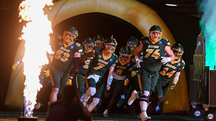North Dakota State Bison football runs out to the field for their semi-final game against the South Dakota State Jackrabbits on Saturday, Dec. 21, 2024, at Fargodome in Fargo, Nouth Dakota.