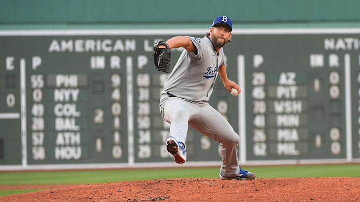 Jul 26, 2025; Boston, Massachusetts, USA; Los Angeles Dodgers starting pitcher Clayton Kershaw (22) pitches  during the first inning against the Boston Red Sox at Fenway Park. 
