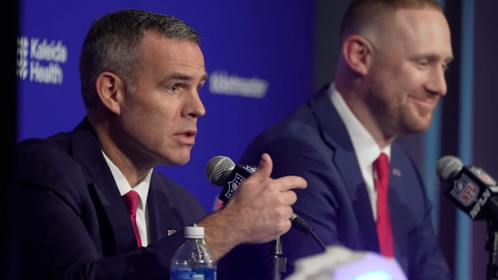 Brandon Beane, president of football operations and general manager for the Buffalo BIlls, and head coach Joe Brady take turns answering questions during a press conference that introduced Brady as the new head coach at the Bills field house in Orchard Park on Jan. 29, 2026.