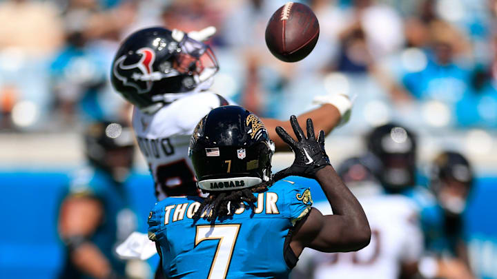 Jacksonville Jaguars wide receiver Brian Thomas Jr. (7) hauls in a reception against Houston Texans linebacker Henry To'Oto'O (39) during the second quarter of an NFL football matchup at EverBank Stadium, Sunday, Sept. 21, 2025, in Jacksonville, Fla. The Jaguars defeated the Texans 17-10. The Jaguars defeated the Texans 17-10. Jacksonville Jaguars wide receiver Brian Thomas Jr. (7) hauls in a reception against Houston Texans linebacker Henry To'Oto'O (39) during the second quarter of an NFL football matchup at EverBank Stadium, Sunday, Sept. 21, 2025, in Jacksonville, Fla. The Jaguars defeated the Texans 17-10. The Jaguars defeated the Texans 17-10.