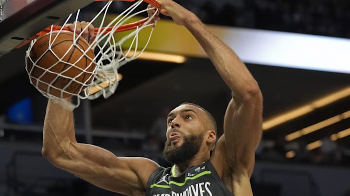 Mar 28, 2025; Minneapolis, Minnesota, USA; Minnesota Timberwolves center Rudy Gobert (27) dunks against the Phoenix Suns in the second quarter at Target Center. Mar 28, 2025; Minneapolis, Minnesota, USA; Minnesota Timberwolves center Rudy Gobert (27) dunks against the Phoenix Suns in the second quarter at Target Center.
