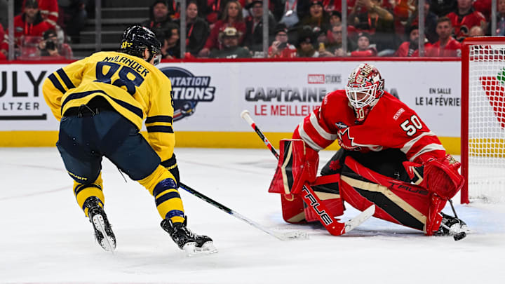 Feb 12, 2025; Montreal, Quebec, CAN; [Imagn Images direct customers only] Team Canada goalie Jordan Binnington (50) makes a save against Team Sweden forward William Nylander (88) in overtime during a 4 Nations Face-Off ice hockey game at Bell Centre. Mandatory Credit: David Kirouac-Imagn Images
