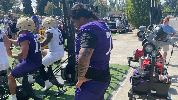 Ah Deong Yang looks spent after the Huskies' second fall practice ends. Ah Deong Yang looks spent after the Huskies' second fall practice ends.