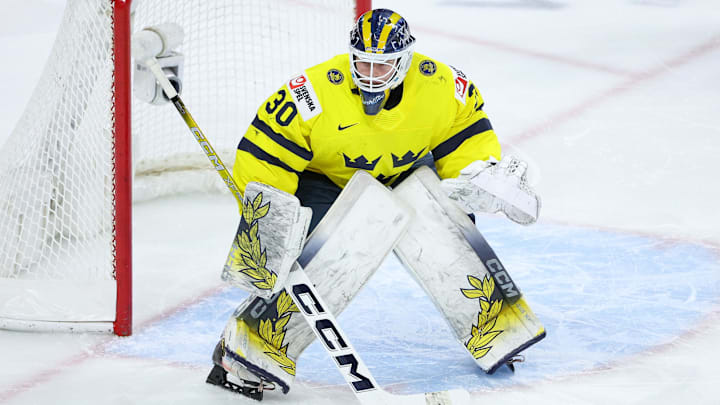 Jan 2, 2026; St. Paul, Minnesota, UNITED STATES; Sweden goalie Love Harenstam (30) defends his net against Latvia during the first period in the quarterfinals of the 2026 IIHF World Junior Championship at Grand Casino Arena. Mandatory Credit: Matt Krohn-Imagn Images