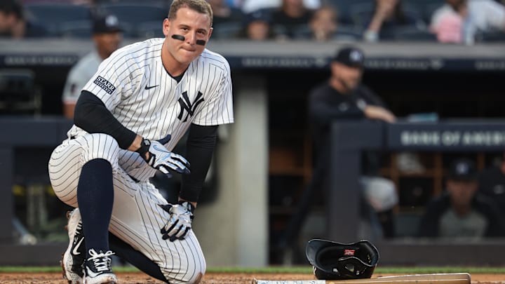 Jun 6, 2024; Bronx, New York, USA; New York Yankees first baseman Anthony Rizzo (48) reacts after being hit by a foul ball during the third inning against the Minnesota Twins at Yankee Stadium. Mandatory Credit: Vincent Carchietta-USA TODAY Sports