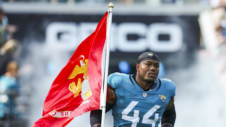 Nov 16, 2025; Jacksonville, Florida, USA; Jacksonville Jaguars defensive end Travon Walker (44) participates in pregame player introductions against the Los Angeles Chargers at EverBank Stadium. Mandatory Credit: Nathan Ray Seebeck-Imagn Images Nov 16, 2025; Jacksonville, Florida, USA; Jacksonville Jaguars defensive end Travon Walker (44) participates in pregame player introductions against the Los Angeles Chargers at EverBank Stadium. Mandatory Credit: Nathan Ray Seebeck-Imagn Images