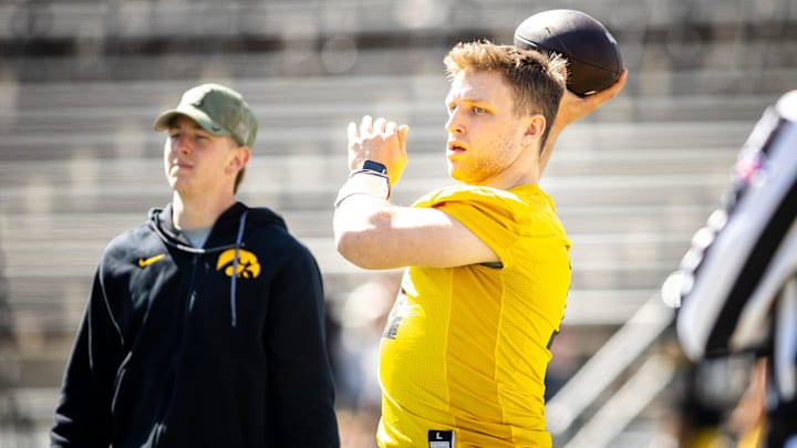 Apr 26, 2025; Iowa City, IA, USA; Iowa quarterback Mark Gronowski (11) throws during a spring NCAA football open practice at Kinnick Stadium. Mandatory Credit: Joseph Cress-The Des Moines Register
