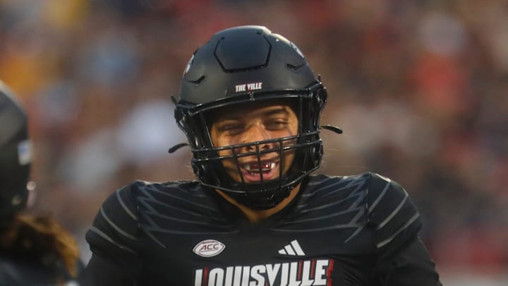Louisville   s Ashton Gillotte celebrates getting a sack against Murray   s DJ Williams on Thursday, Sept. 7, 2023.