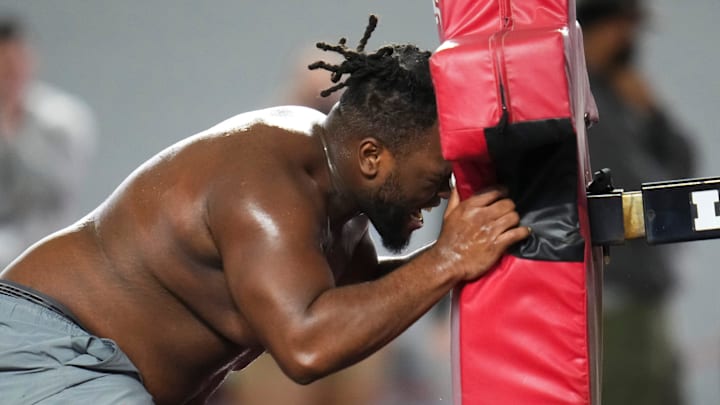 Ohio State Buckeyes defensive tackle Kayden McDonald hits the sled during the March 25 pro day.