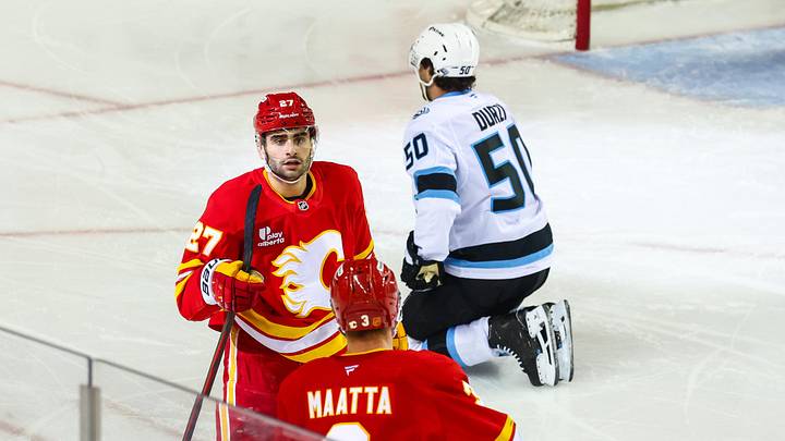 Apr 12, 2026; Calgary, Alberta, CAN; Calgary Flames right wing Matt Coronato (27) celebrates his goal with teammates against the Utah Mammoth during the first period at Scotiabank Saddledome. Mandatory Credit: Sergei Belski-USA TODAY Sports
