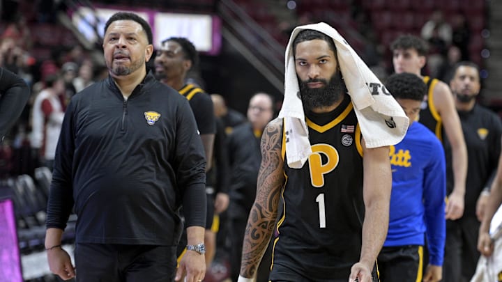 Jan 15, 2025; Tallahassee, Florida, USA; Pittsburgh Panthers head coach Jeff Capel and guard Damian Dunn (1) walk off the court after the loss to the Florida State Seminoles at Donald L. Tucker Center. Mandatory Credit: Melina Myers-Imagn Images Jan 15, 2025; Tallahassee, Florida, USA; Pittsburgh Panthers head coach Jeff Capel and guard Damian Dunn (1) walk off the court after the loss to the Florida State Seminoles at Donald L. Tucker Center. Mandatory Credit: Melina Myers-Imagn Images