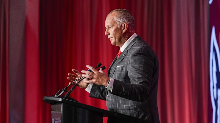 Jul 25, 2024; Charlotte, NC, USA;  North Carolina State Wolfpack head coach Dave Doeren speaks to the media during the ACC Kickoff at Hilton Charlotte Uptown. Mandatory Credit: Jim Dedmon-Imagn Images